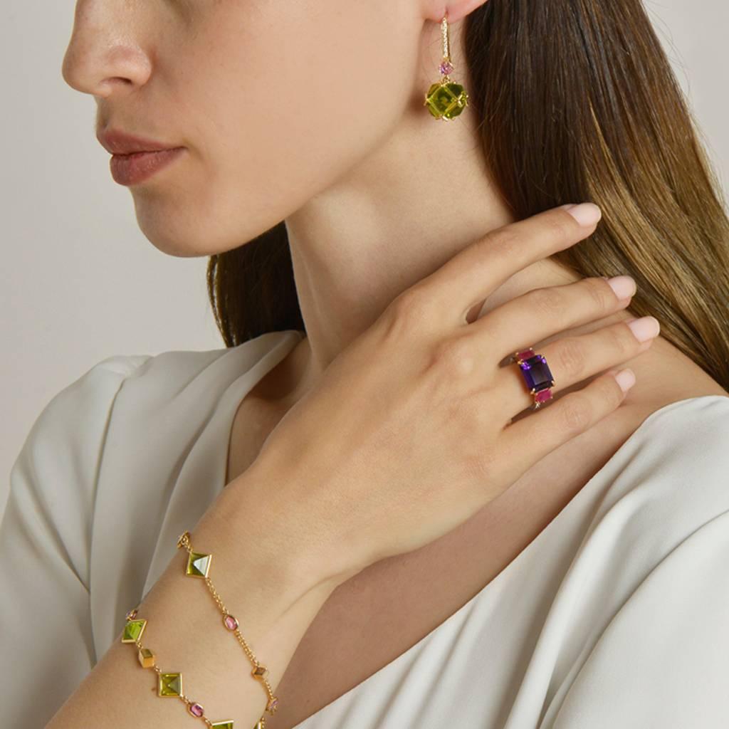18kt yellow gold Very PC® earrings with reverse set emerald-cut peridots 30.50 carats, round pink sapphires .60 carats and pave-set round brilliant diamonds 0.17 carats.

Staying true to Paolo Costagli’s appreciation for modern and clean geometries,