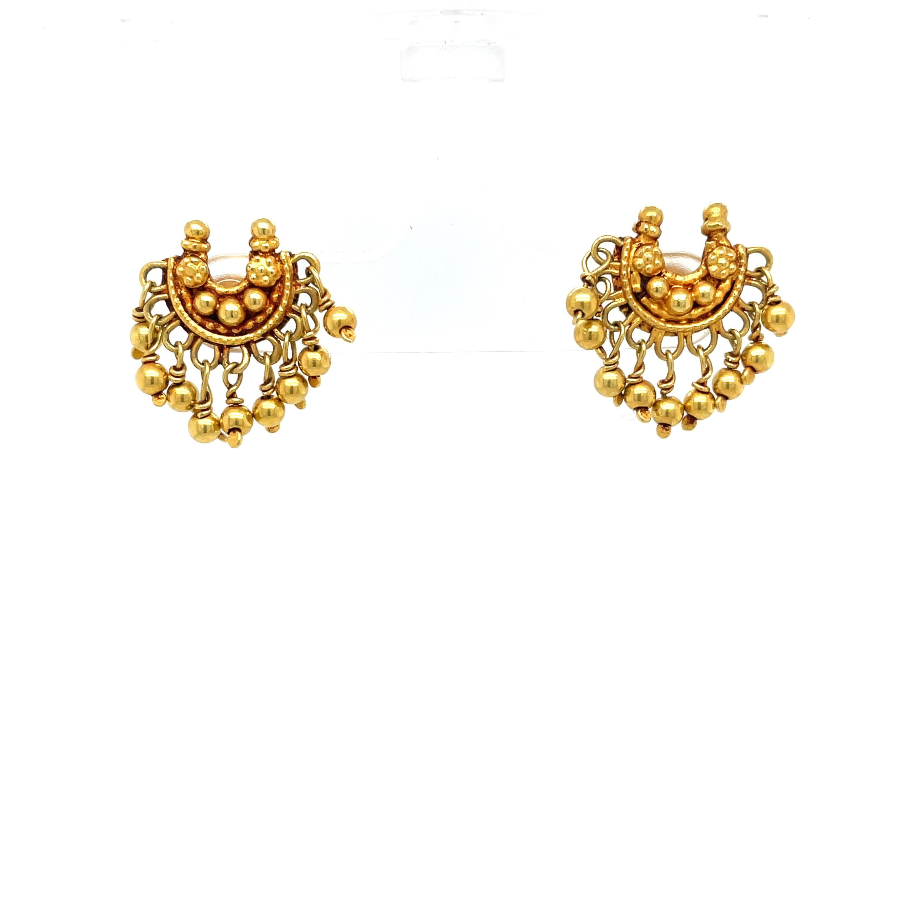 Artisan made 18 karat yellow gold earring pair, crafted in Indian traditional antique Chandbali style. This petite one half inch version of what are typically large heavy bold pieces works as an artful accent accessory in real gold. Ornate and