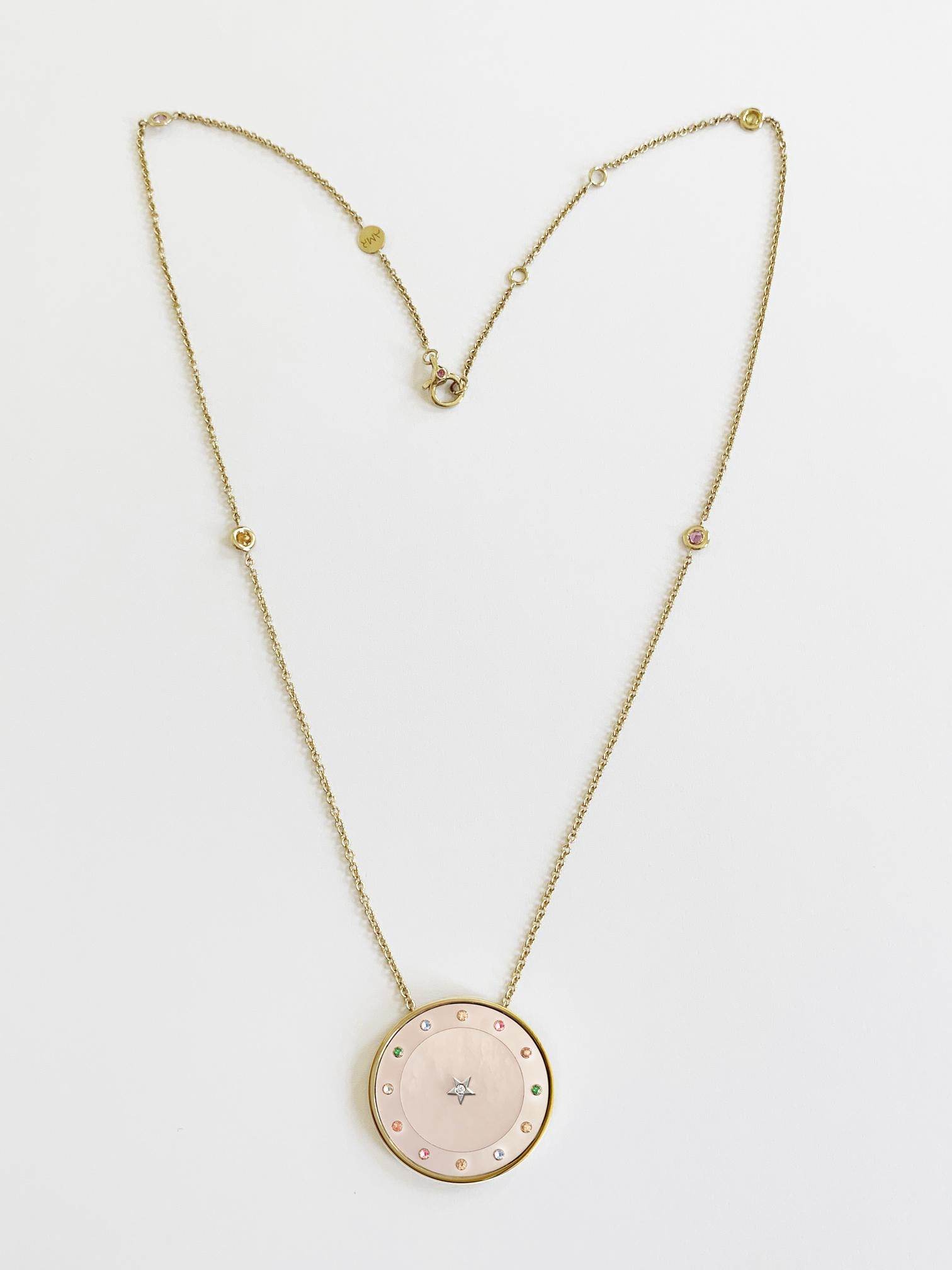 
Fascinated by the concept of time, Rossi creates thoughtful collections that display the splendor of having something beautiful remind you to be present each day.
 
Ora Chevalier Pendant- 18 Karat yellow gold, pink pale mother of pearl, dial