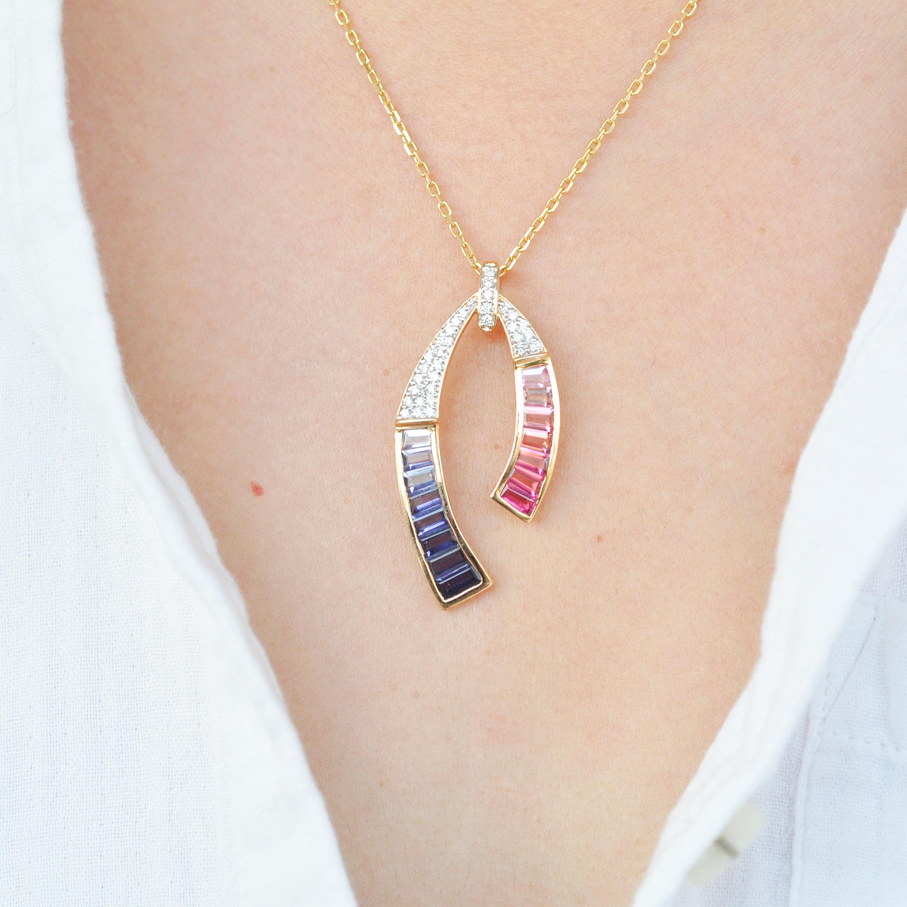 18 karat yellow gold pink tourmaline iolite baguette diamond pendant necklace

Inspired by the horse-shoe design, this pendant made in 18k yellow gold gives it a contemporary make-over. Line art clubbed with pave studded diamonds and vibrant