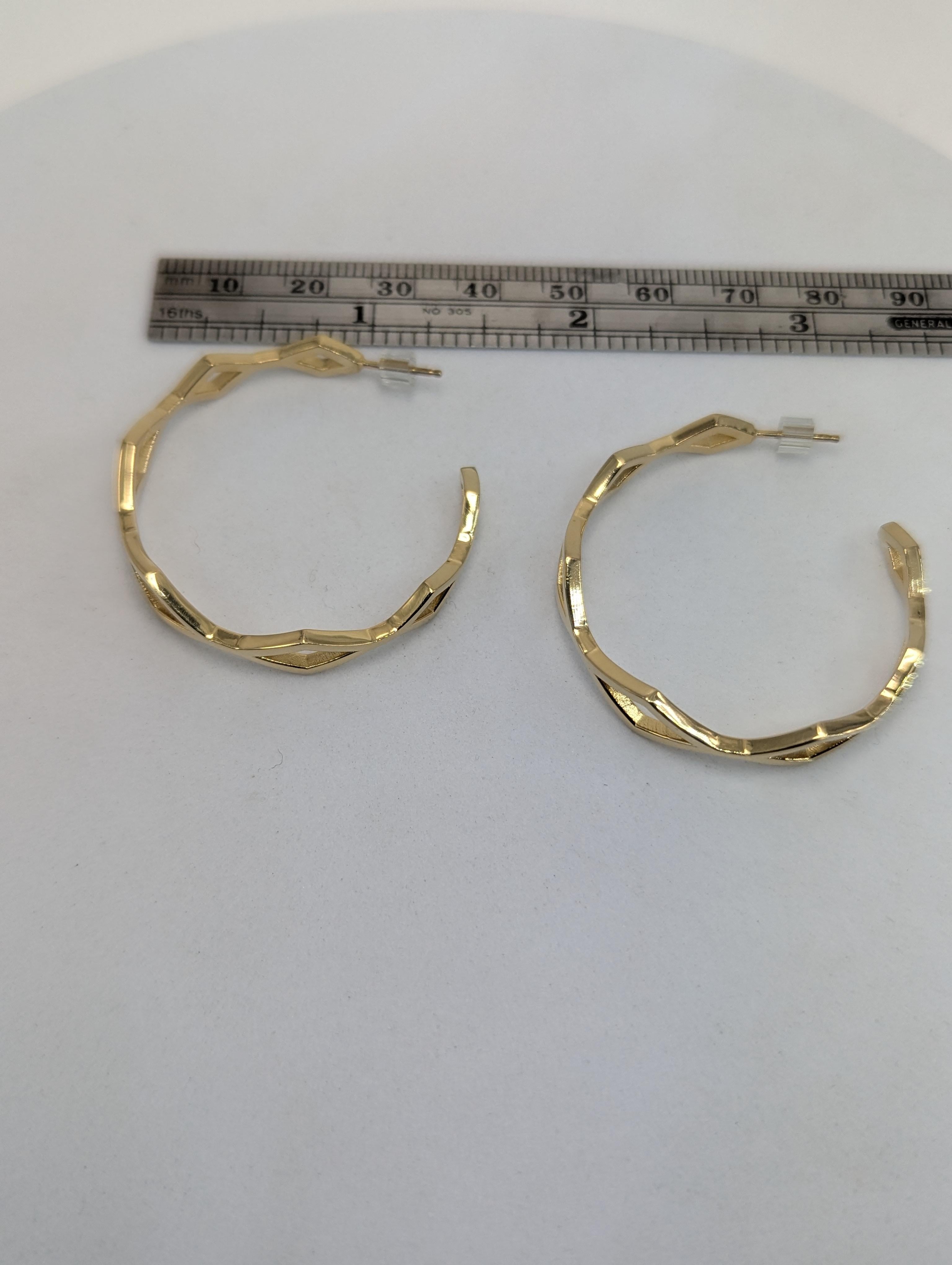 Contemporary 18 Karat Yellow Gold plated 39 mm diameter Seven Rhombus Hoops For Sale