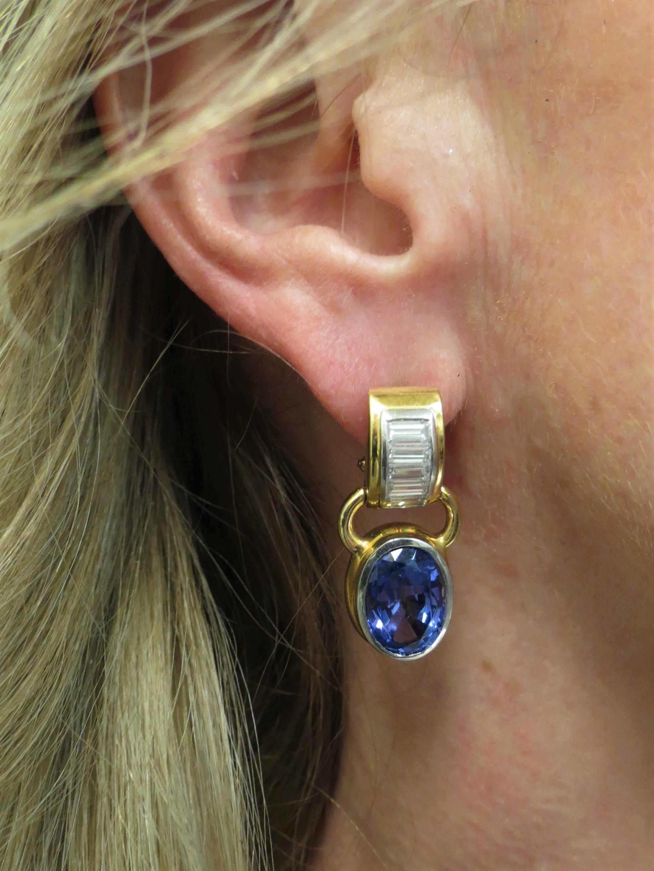 18K yellow gold and platinum earrings, by Susan Berman, bezel set with two oval faceted Tanzanites weighing 11.45ct total and 10 channel set Baguette diamonds weighing. 1.59cts total
Original retail: $12,500
