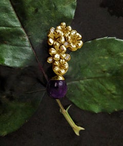 Eighteen Karat Yellow Gold Plum Blossom Brooch with Diamonds and Amethyst