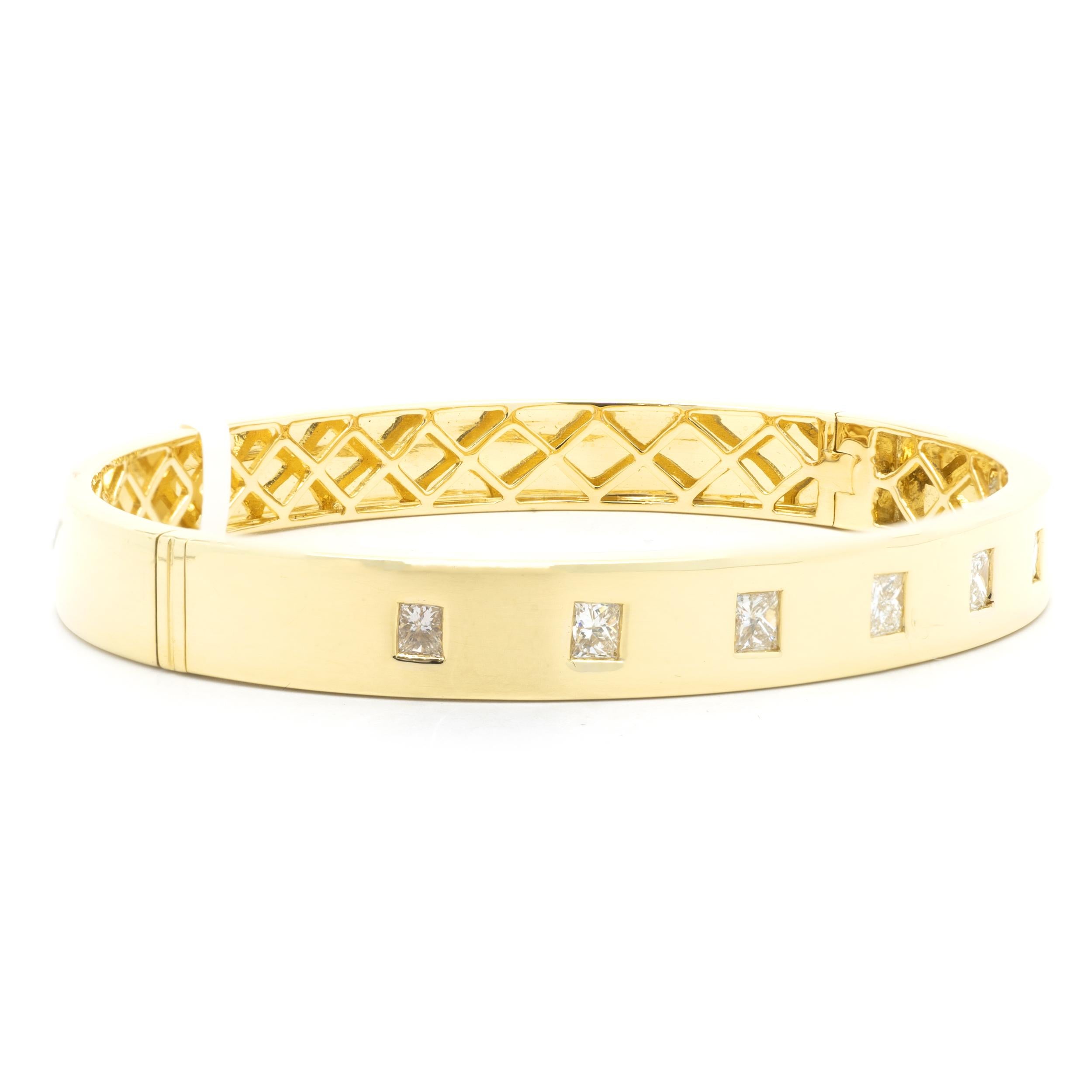 Designer: custom
Material: 18K yellow gold
Diamonds: 8 princess cut = 1.30cttw
Color: G
Clarity: VS2
Dimensions: bracelet will fit up to a 7-inch wrist
Weight: 20.18 grams
