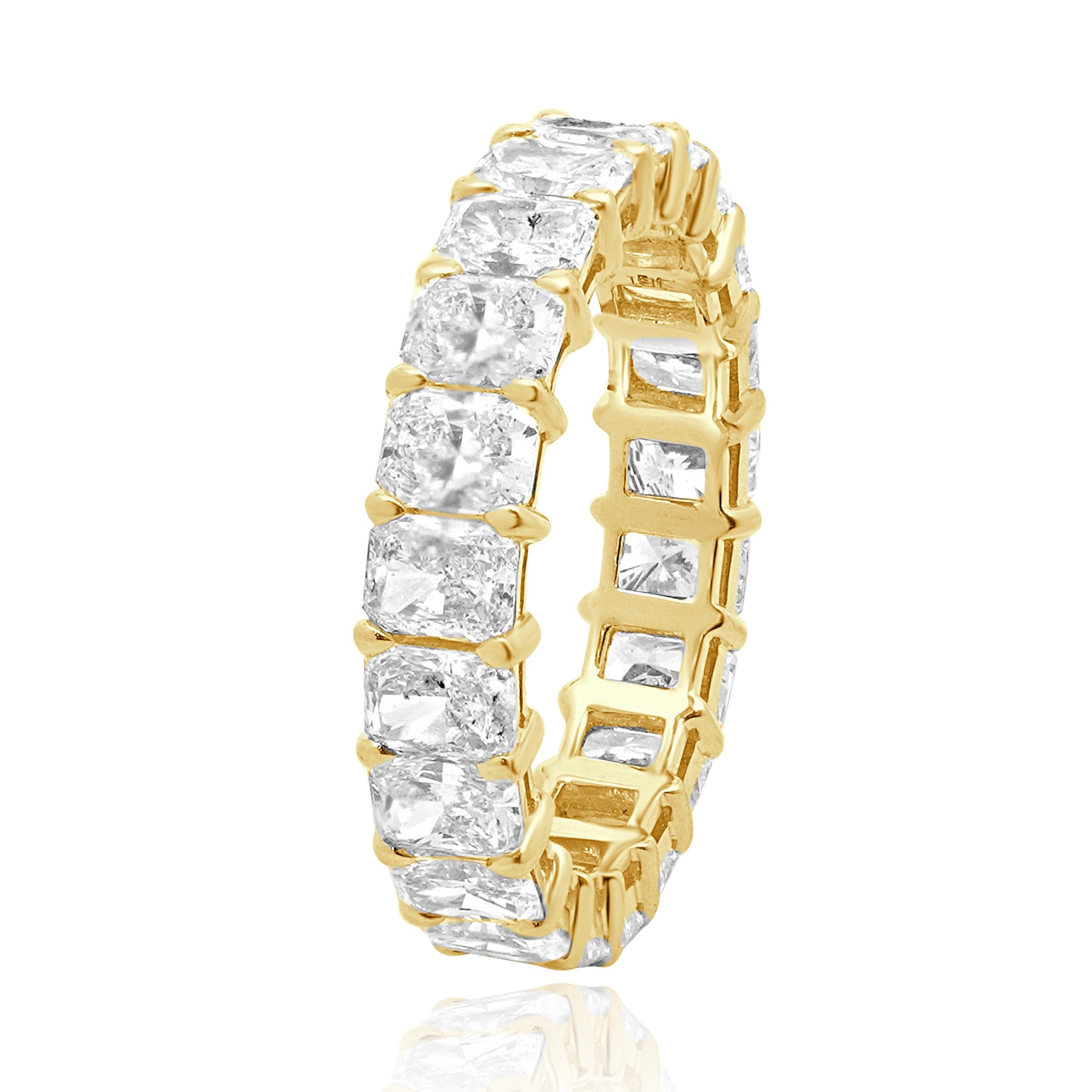 Designer: custom
Material: 18K yellow gold
Diamond: 21 radiant cut = 4.25cttw
Color: G / H
Clarity: VS2
Ring size: 6.5 (please allow two additional shipping days for sizing requests)
Weight: 3.54 grams
