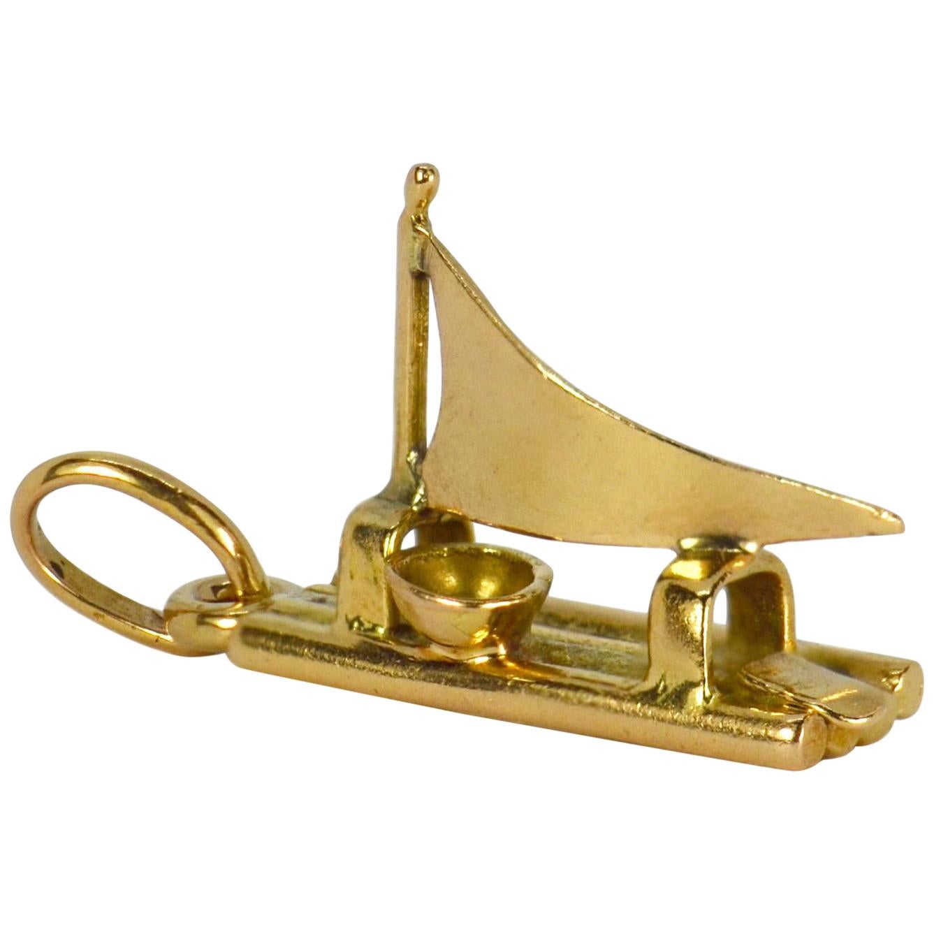 18 Karat Yellow Gold Raft Charm Pendant For Sale