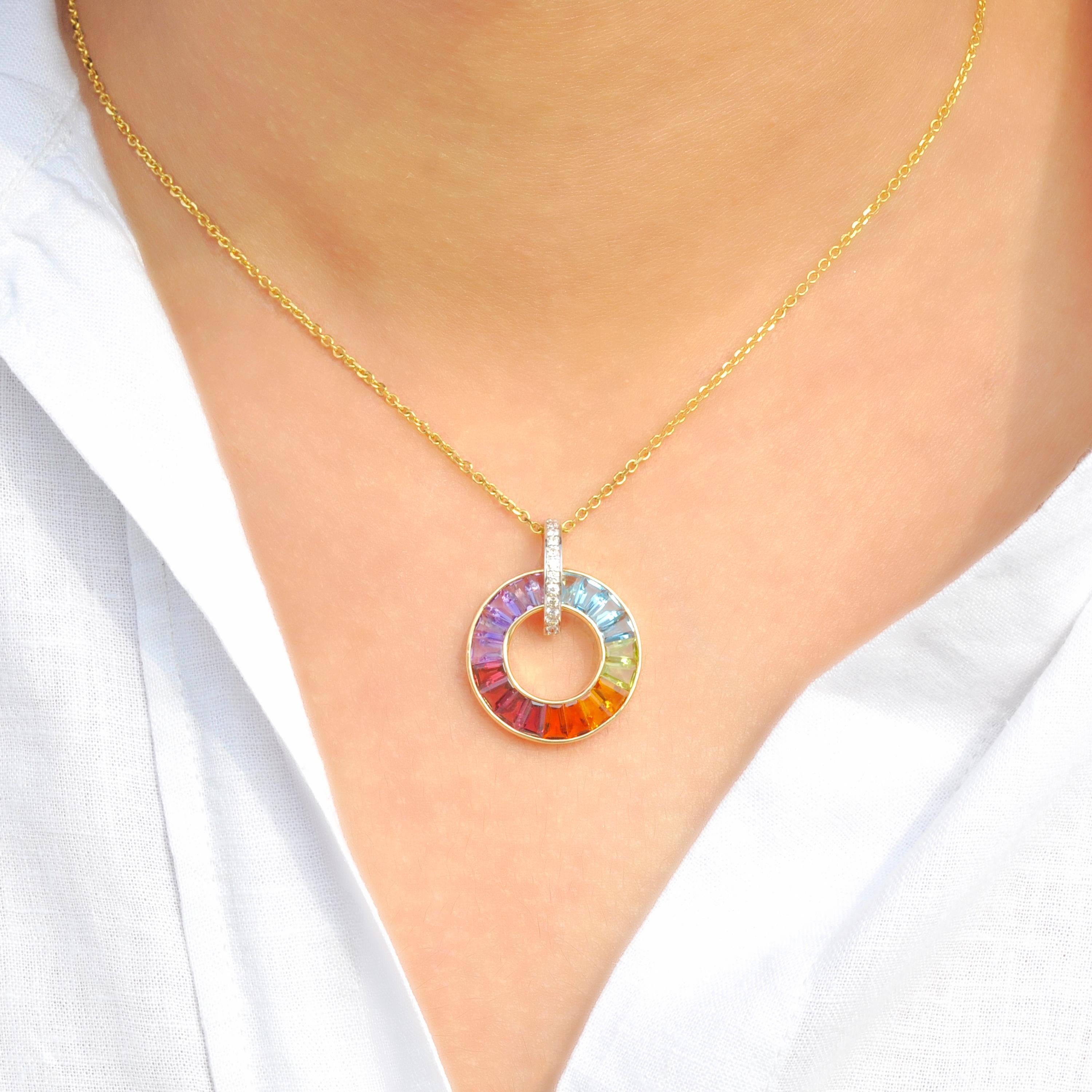 18 Karat Yellow Gold Handcrafted Rainbow Natural Gemstones Circle Diamond Pendant Earrings Set.

This extraordinary set in 18k gold with tapered cut rainbow natural gemstones and diamonds is a celebration of vibrant hues and unparalleled