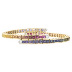 18 Karat Yellow Gold Rainbow Sapphire and Diamond Bypass Bracelet