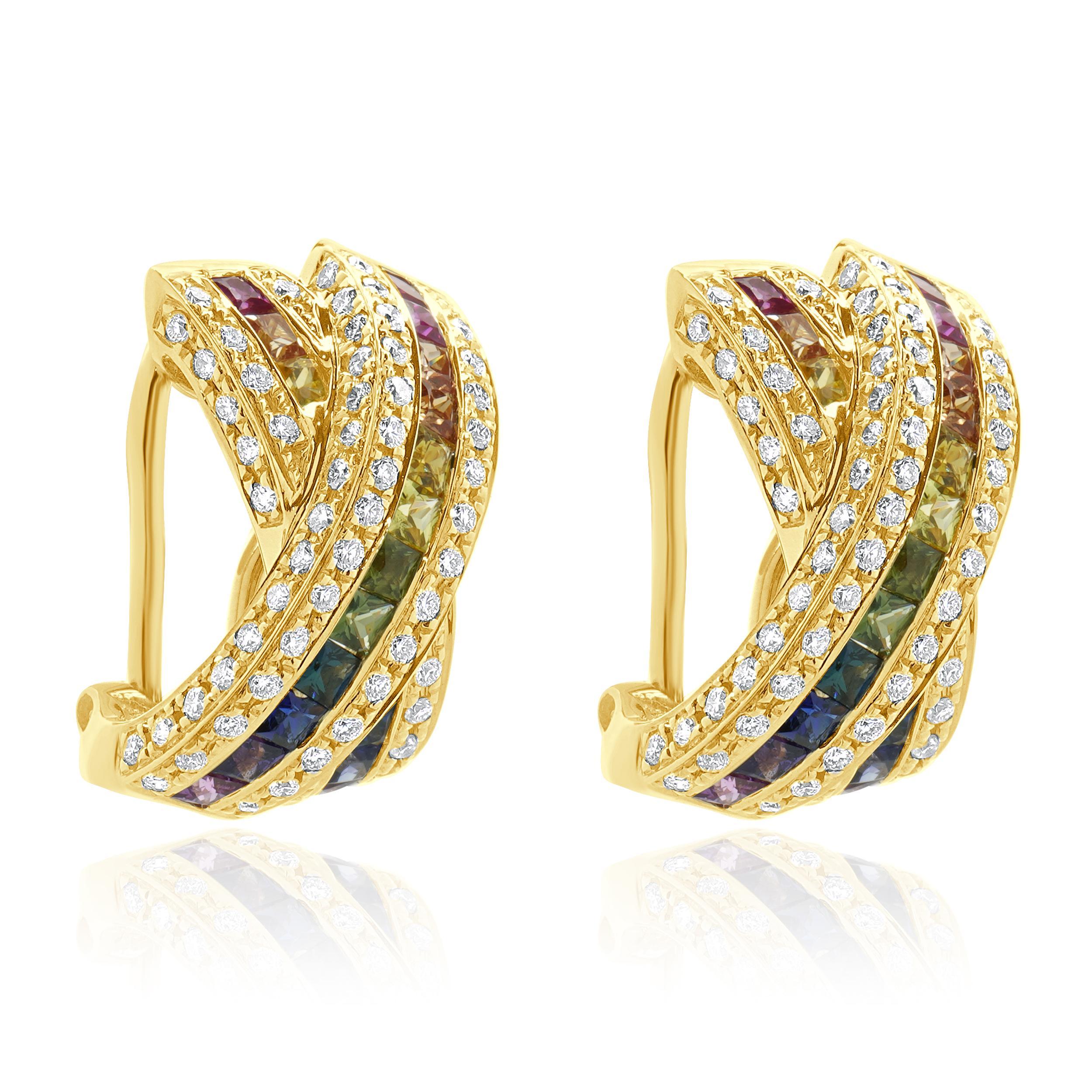 Designer: custom
Material: 18K yellow gold
Diamonds: round brilliant diamonds= 1.04cttw 
Color: G
Clarity: VS1-2
Rainbow Sapphire: princess cut = 2.07cttw
Weight: 10.85 grams