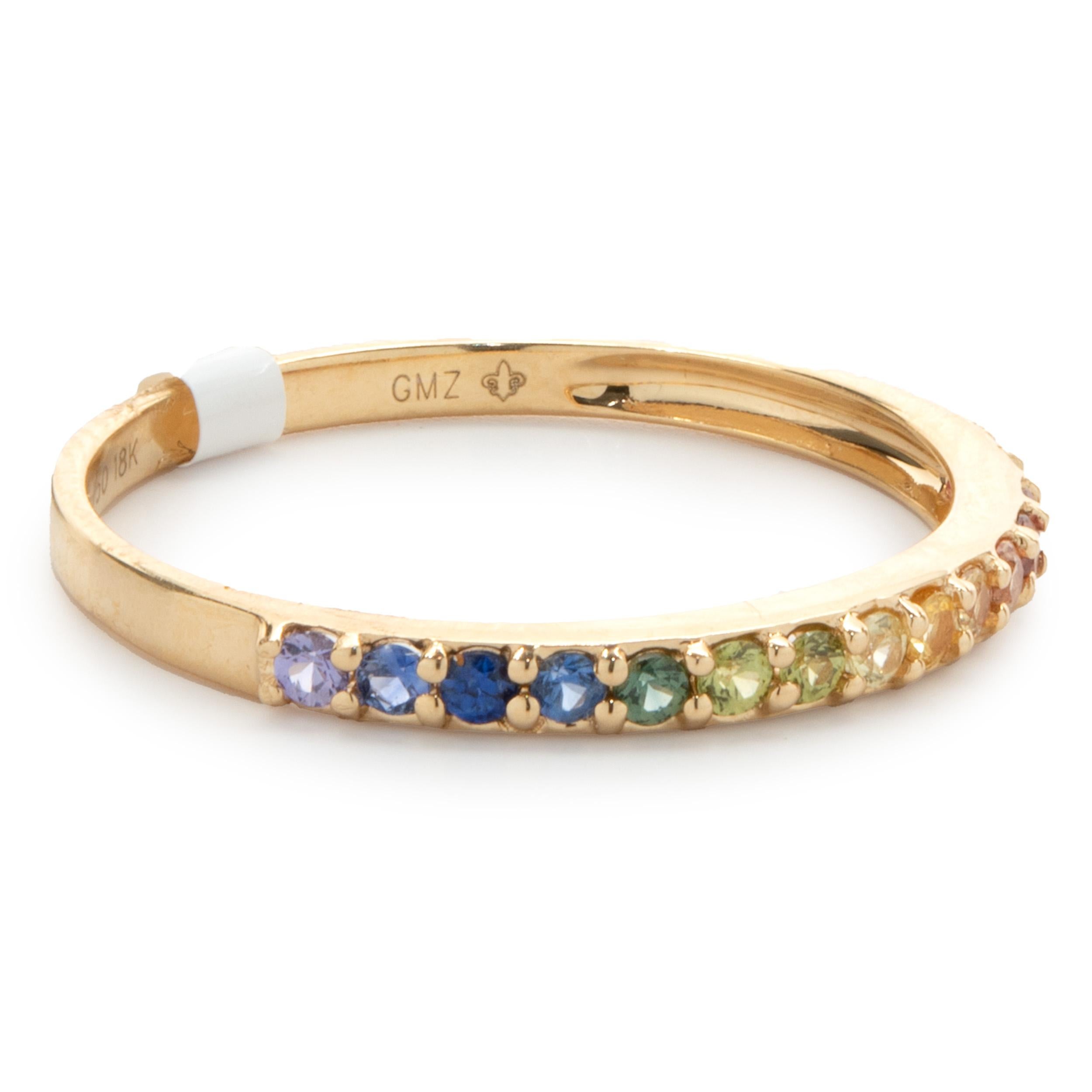 Designer: custom design
Material: 18K yellow gold
Sapphire: 15 round cut = 0.28cttw
Dimensions: ring top measures 2mm wide
Ring Size: 7 (please allow two extra shipping days for sizing requests) 
Weight: 1.44 grams
