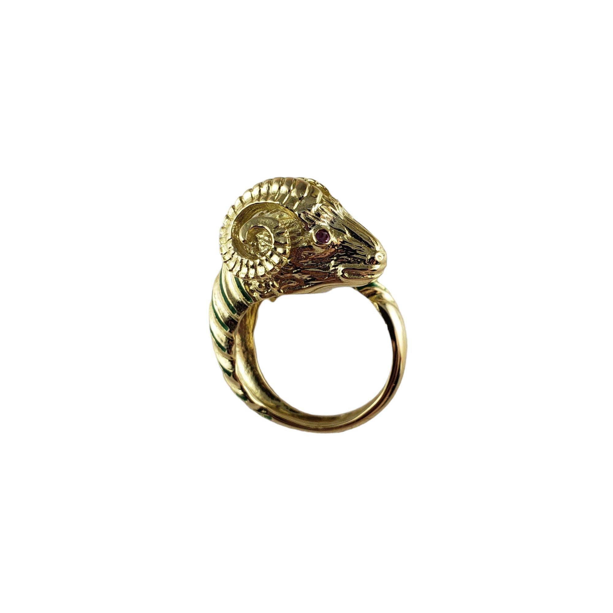 Vintage 18 Karat Yellow Gold Ram Ring Size 7-

This stunning 18K yellow gold ring features a beautifully detailed ram's head accented with green enamel and two red faceted stone eyes.  Width:  20 mm.  Shank: 3 mm.

Ring Size:  7

Weight:  9.5 dwt. /
