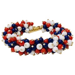 18 Karat Yellow Gold Red, White and Blue Bracelet, Ring and Earring Suite