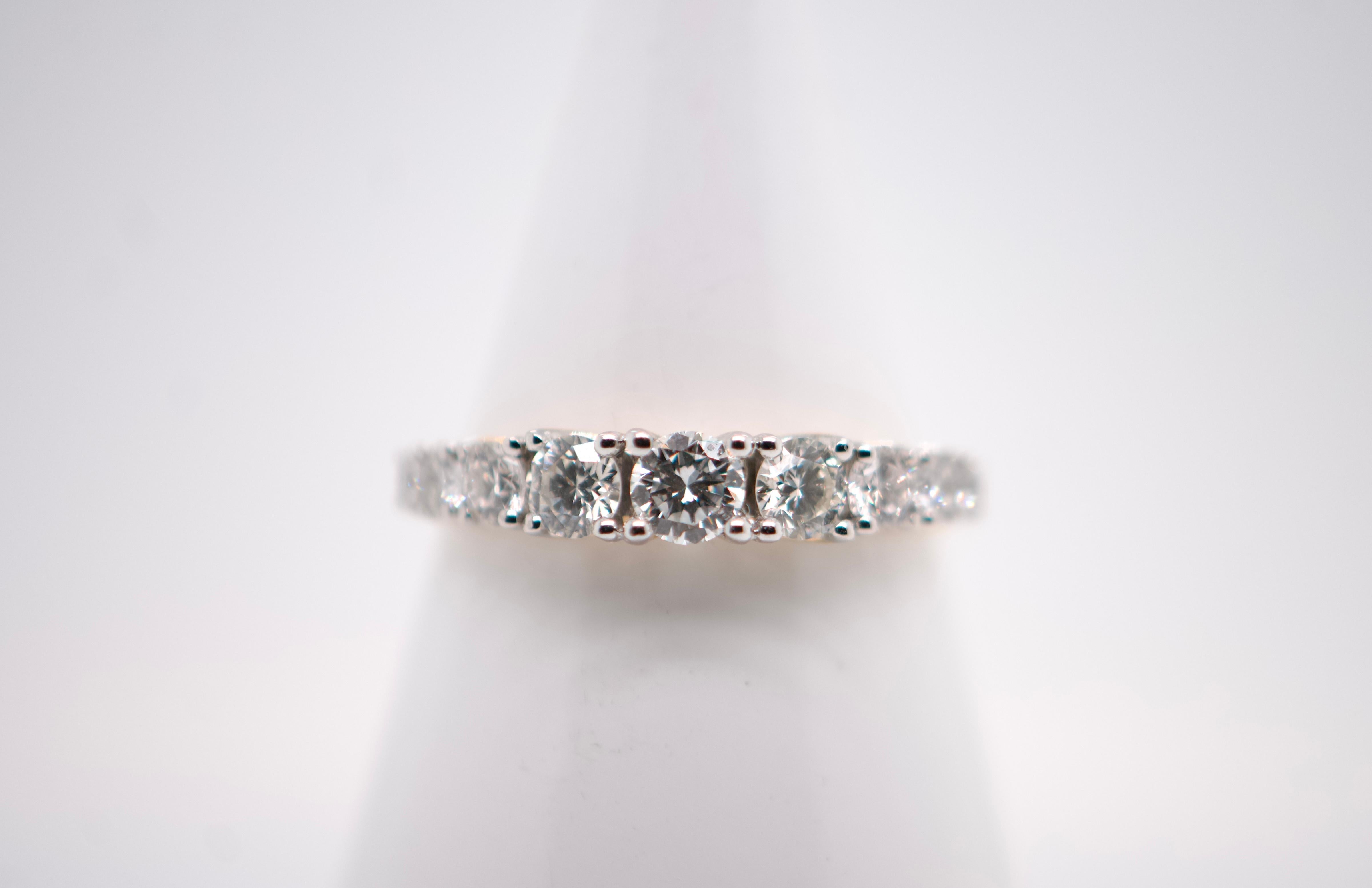 This exquisite 18-karat yellow gold ring epitomizes the pinnacle of elegance and sophistication. Encrusted with eight brilliant-cut diamonds, it radiates exceptional brightness, totaling 0.75 carats. Each diamond, chosen for its G color, symbolizes
