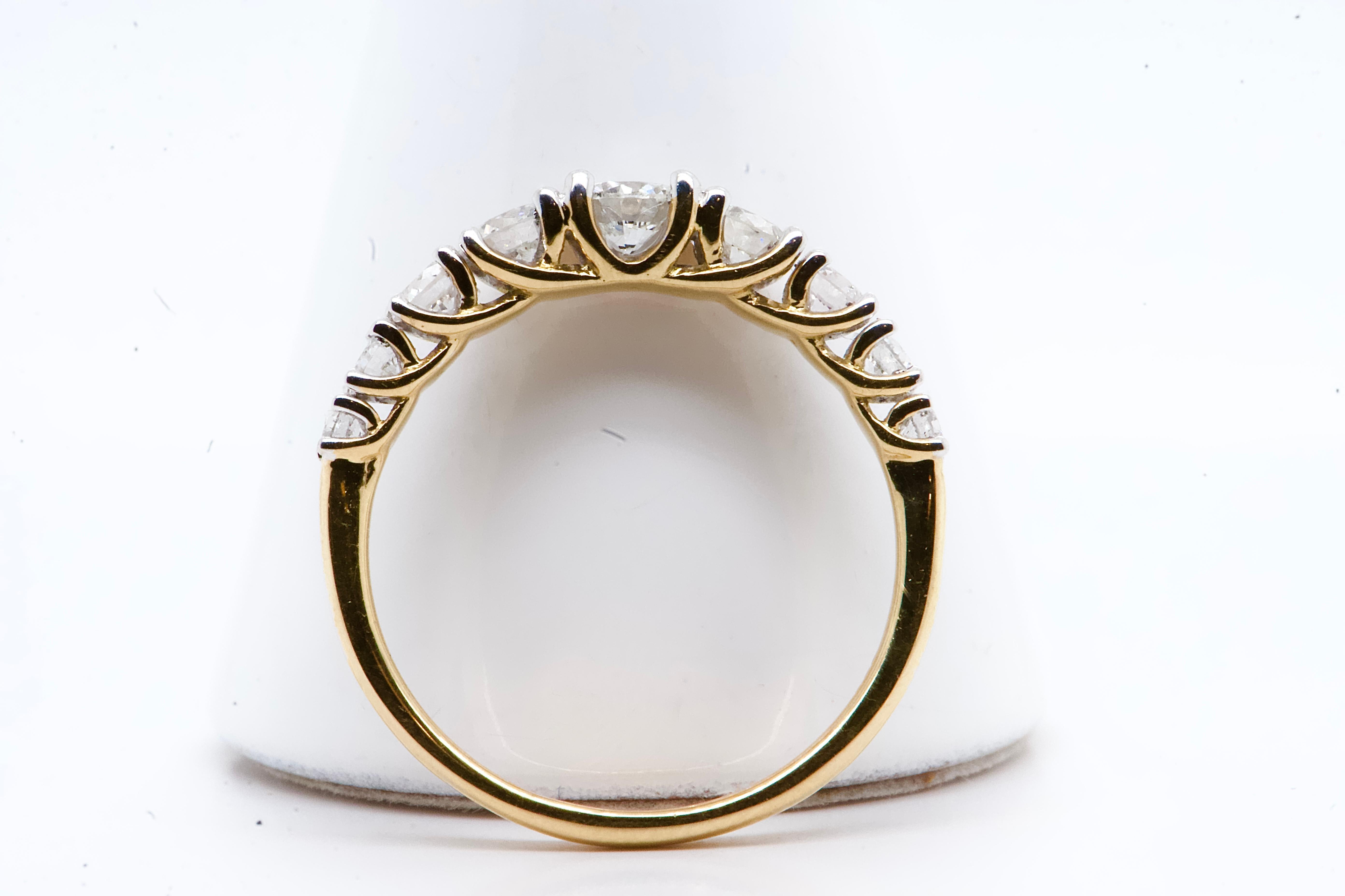 Women's 18-Karat Yellow Gold Ring Adorned with Eight 0.75 Carat Diamonds For Sale
