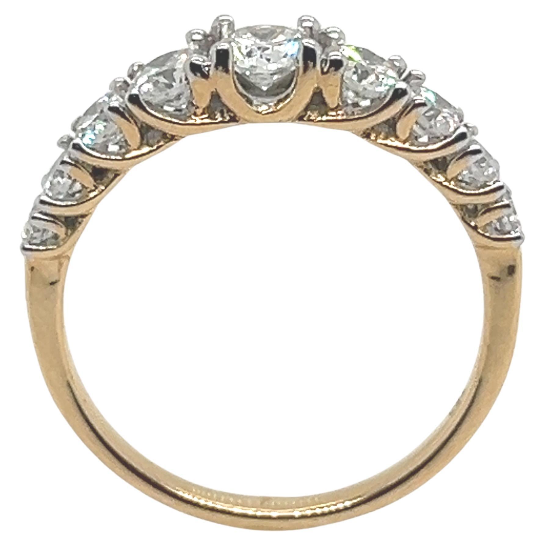 18-Karat Yellow Gold Ring Adorned with Eight 0.75 Carat Diamonds