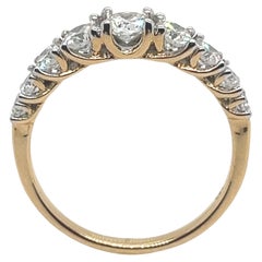 18-Karat Yellow Gold Ring Adorned with Eight 0.75 Carat Diamonds