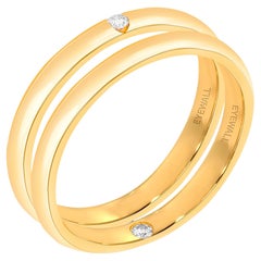 18 Karat Yellow Gold Ring Pair with Diamond Inset