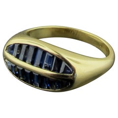 18 Karat Yellow Gold Ring with 16 Blue Sapphires