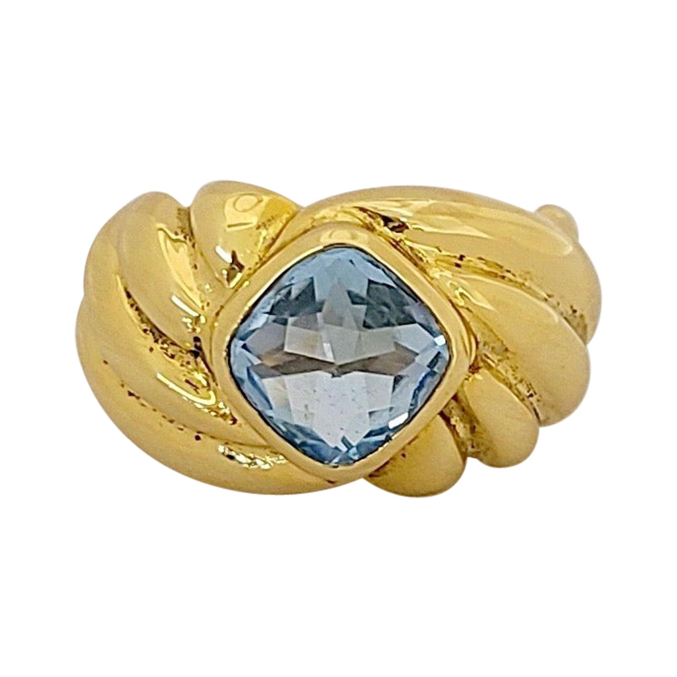 18 Karat Yellow Gold Ring with 2.80 Carat Cushion Cut Blue Topaz For Sale