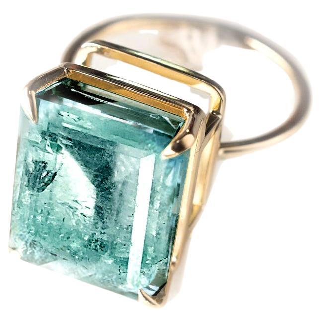 Yellow Gold Ring with Three Carats Very Blue Neon Paraiba Tourmaline For Sale