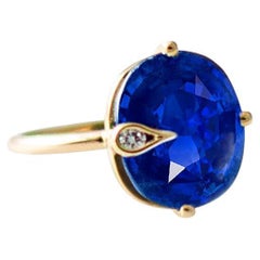 18 Karat Yellow Gold Ring with 4,1 Carats Vivid Blue Sapphire and Diamond