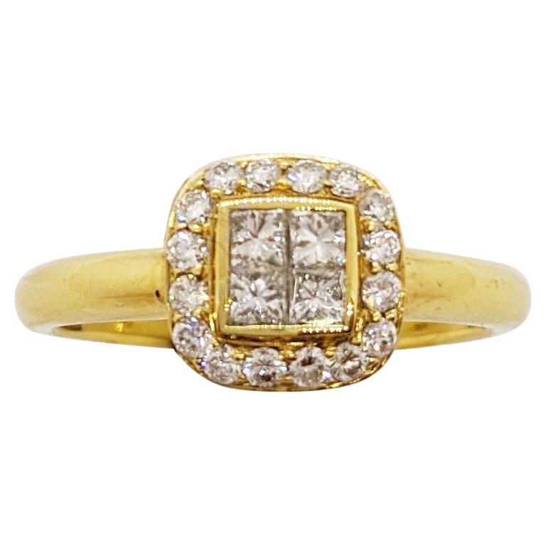 18 Karat Yellow Gold Ring with .55 Carat Princess Cut and Round Diamonds For Sale