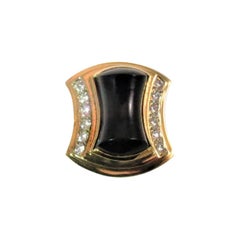 Retro 18 Karat Yellow Gold Ring with Black Onyx and Diamonds