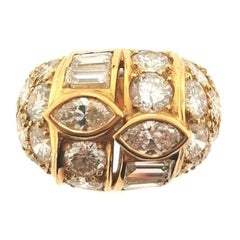 18 Karat Yellow Gold Ring with Brilliant, Baguette and Marqisse Cut Diamonds