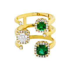 18 Karat Yellow Gold Ring with Brilliant cut White Diamonds and Emeralds