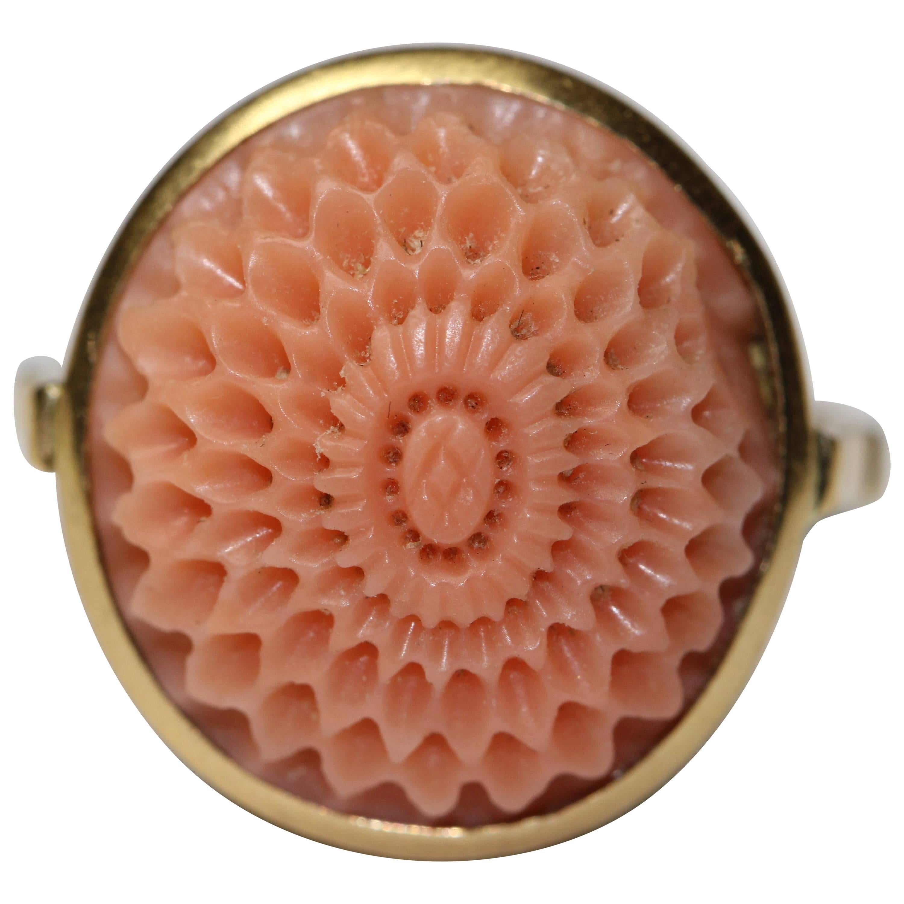 18 Karat Yellow Gold Ring with Intricately Carved Salmon Coral For Sale