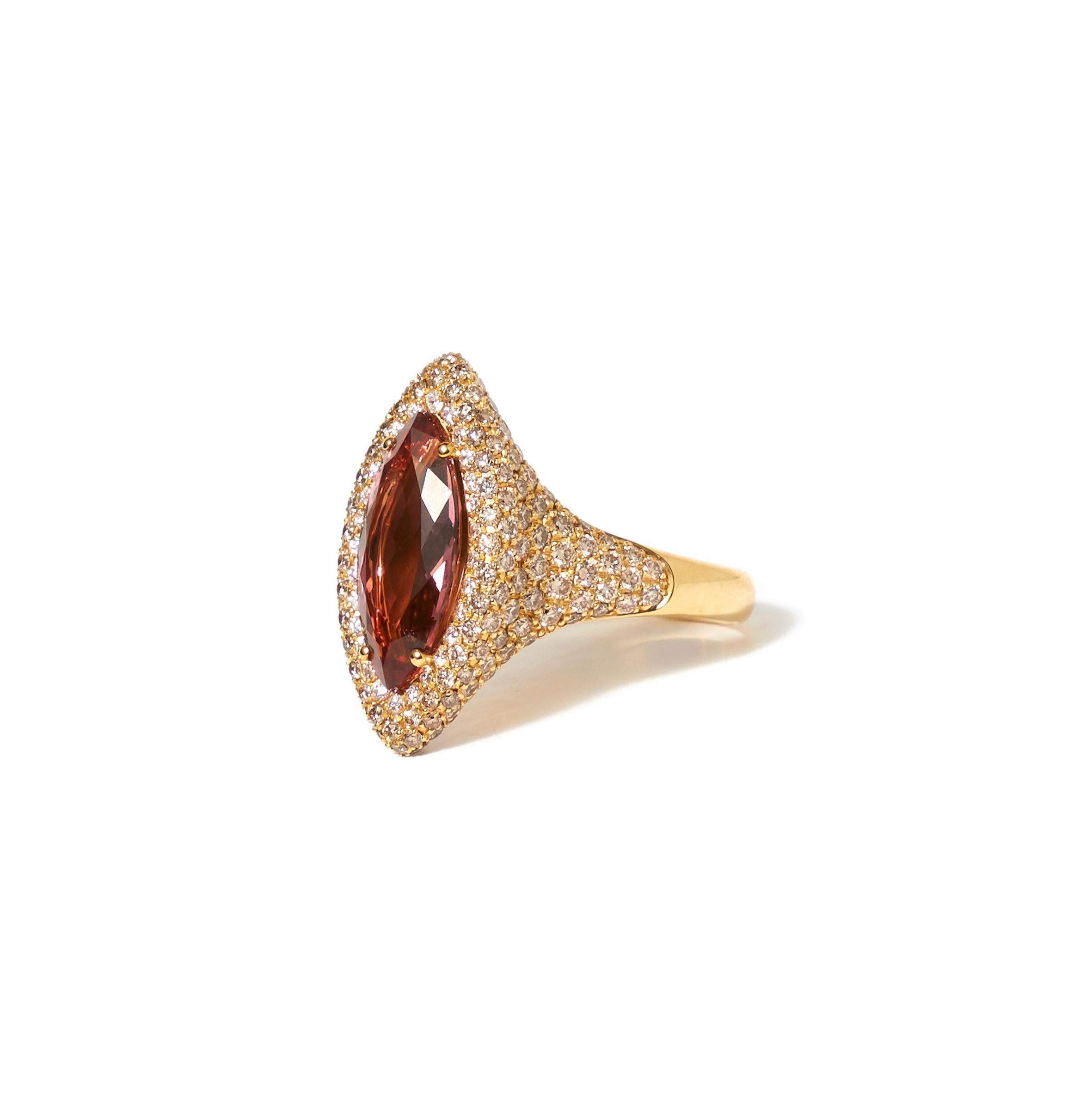 Yellow gold ring set with a navette cut tourmaline and diamonds

Who doesn’t fall for the charm of burgundy red tourmaline? The elegant, almost royal color of this rare tourmaline does not escape anyone’s attention and appeals to the imagination.