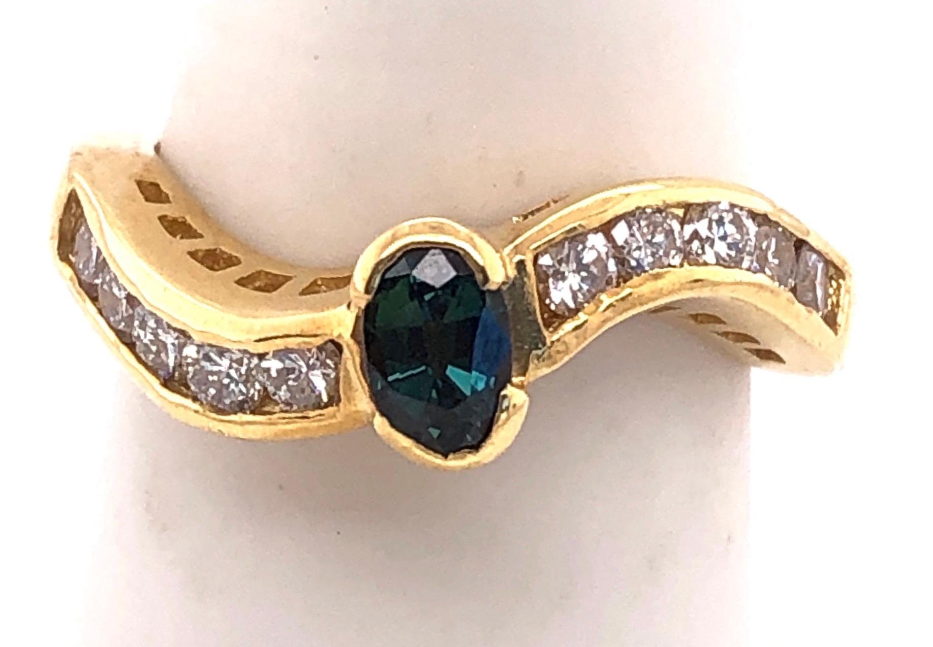 18 Karat Yellow Gold Ring with Sapphire Center and Diamond Accents 0.80 TDW For Sale 7