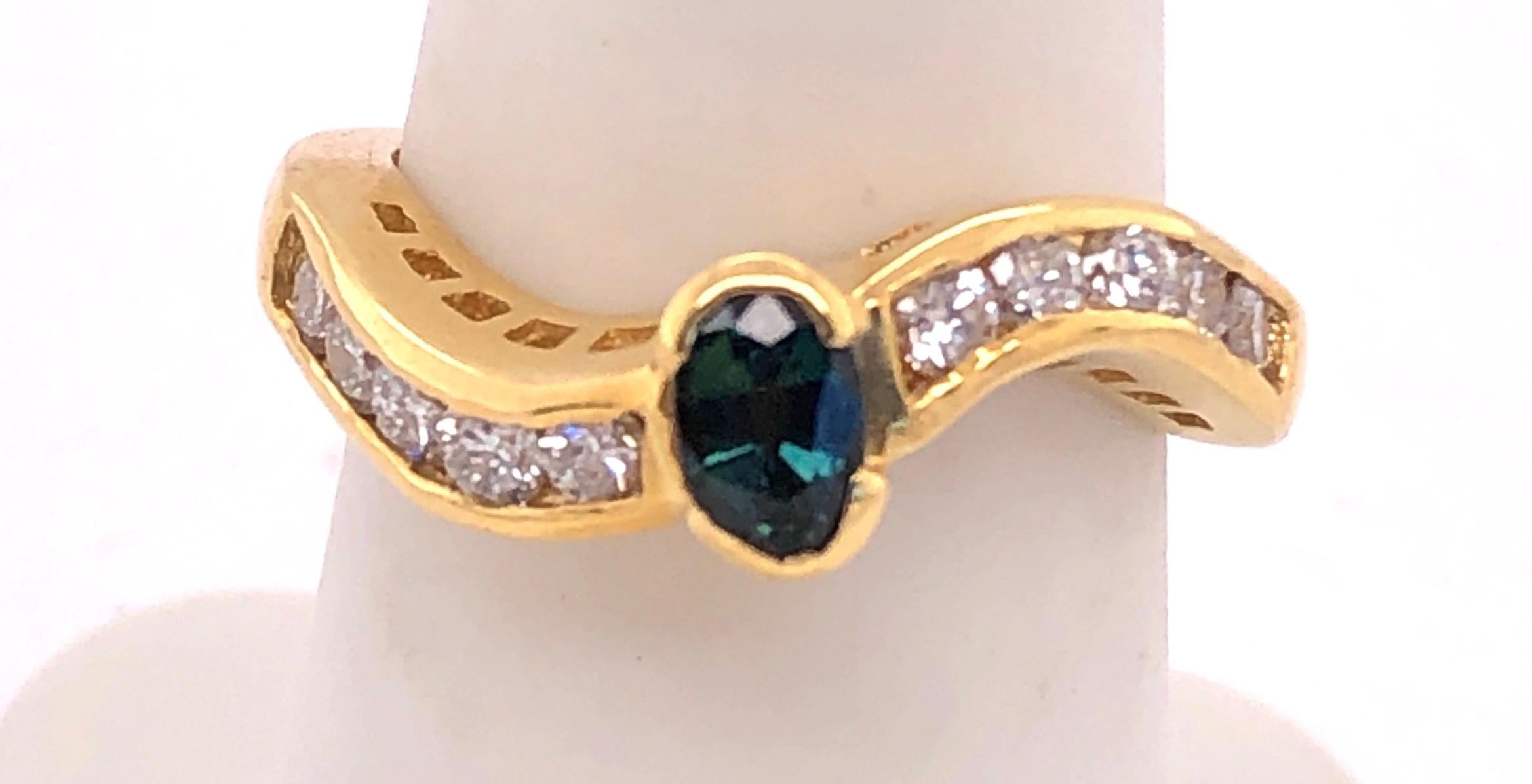 18 Karat Yellow Gold Ring With Sapphire Center And Diamond Accents 
0.80 Total Diamond Weight
Size 6.75 
5.65 grams total weight