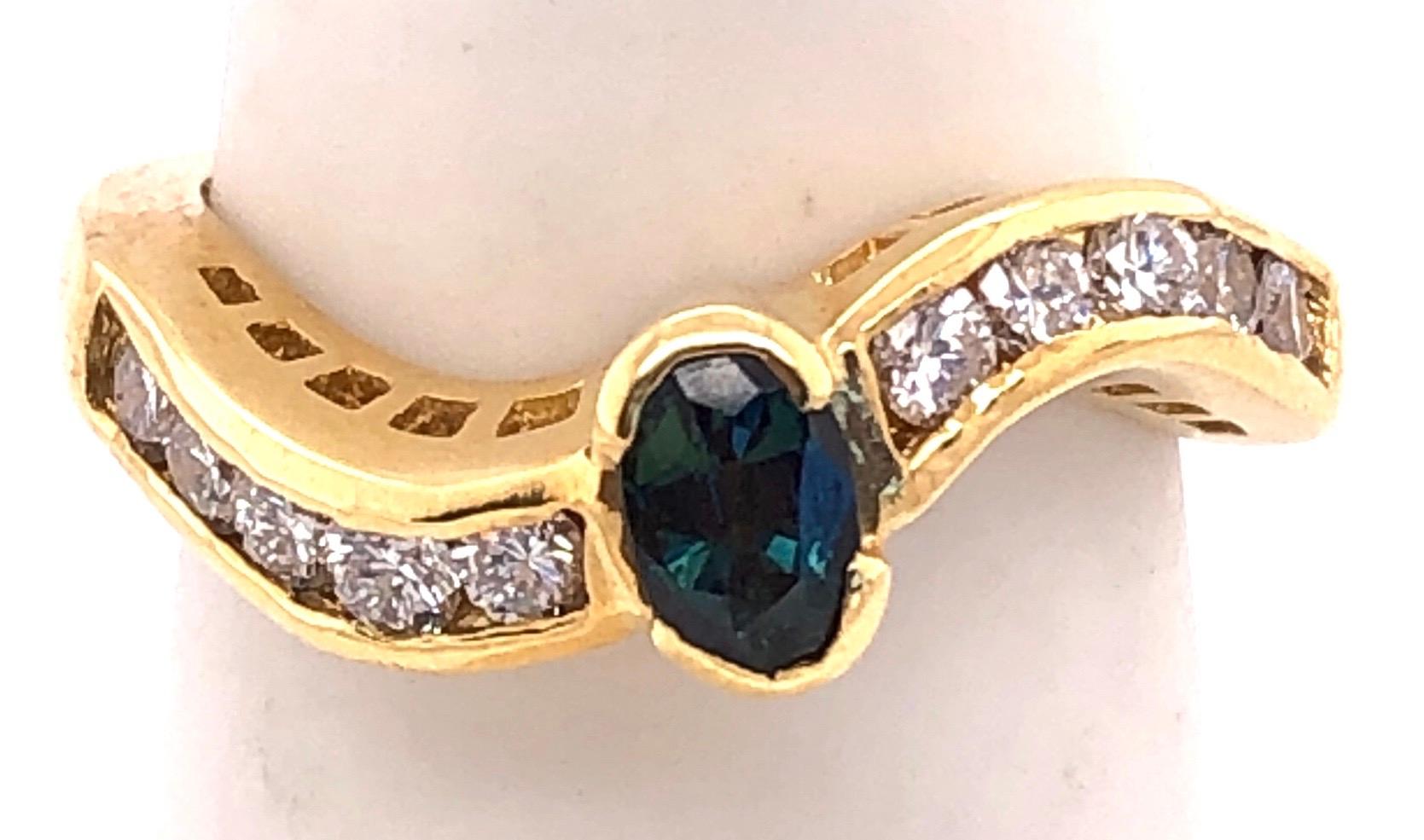 18 Karat Yellow Gold Ring with Sapphire Center and Diamond Accents 0.80 TDW For Sale 4
