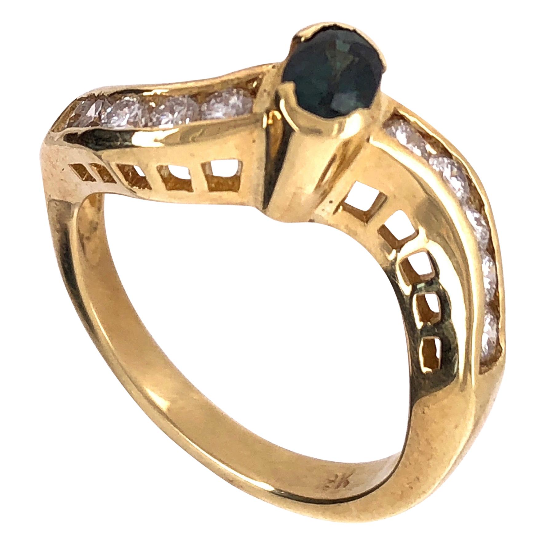 18 Karat Yellow Gold Ring with Sapphire Center and Diamond Accents 0.80 TDW