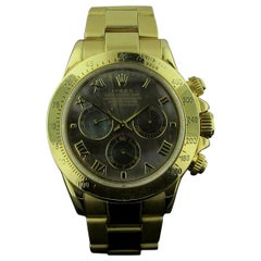 18 Karat Yellow Gold Rolex "Daytona" with Black Mother of Pearl Dial