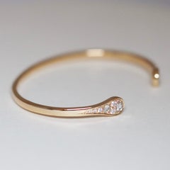 Brazalete de oro amarillo de 18 quilates con diamantes talla rosa y talla brillante