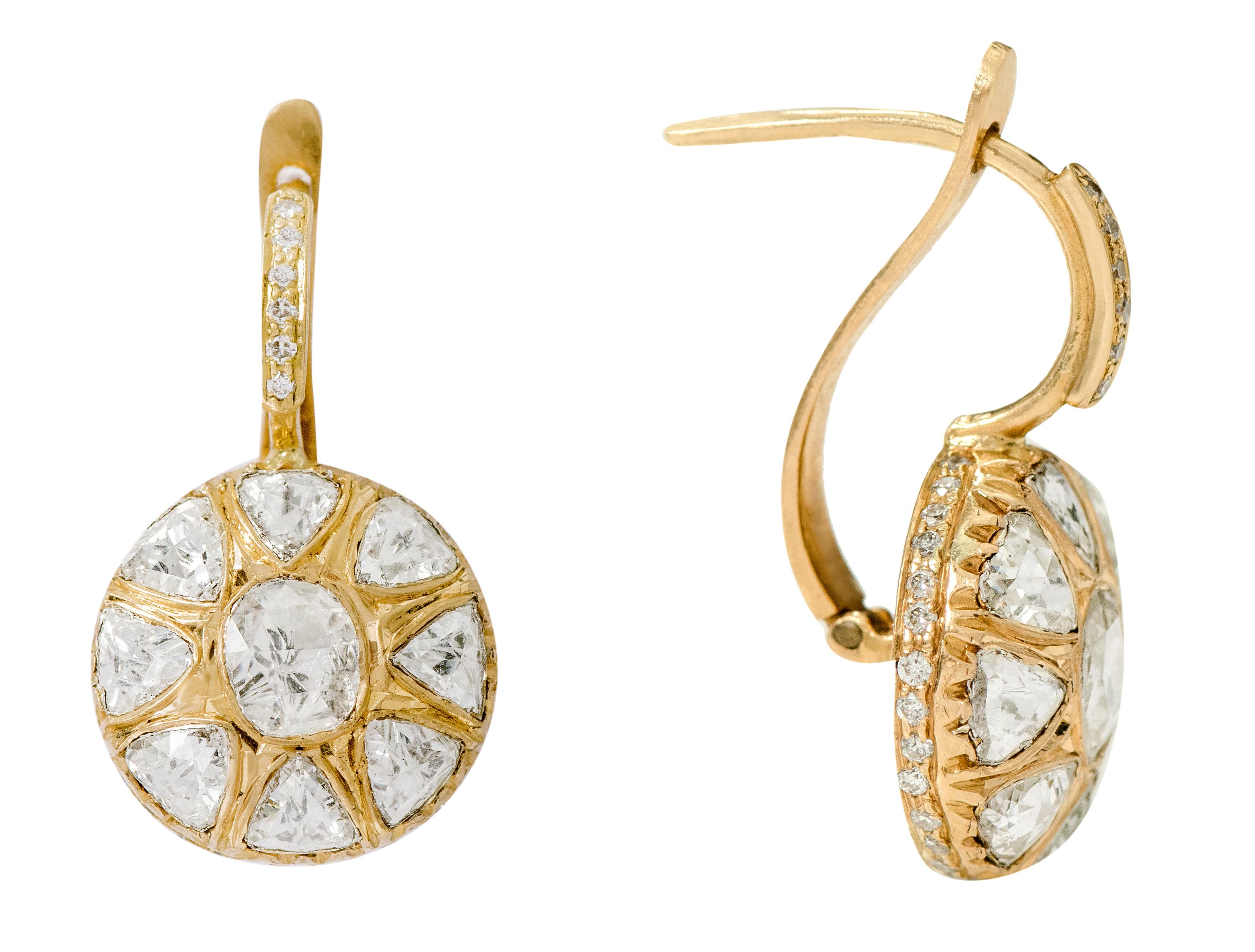 18 Karat Yellow Gold Rose-Cut Diamond Dangle Earrings in Art-Deco Style

This Victorian period art-deco style atypical rose-cut diamond earring is royal. The uneven uniquely cut matching triangle shaped rose cut diamond solitaire set in bezel