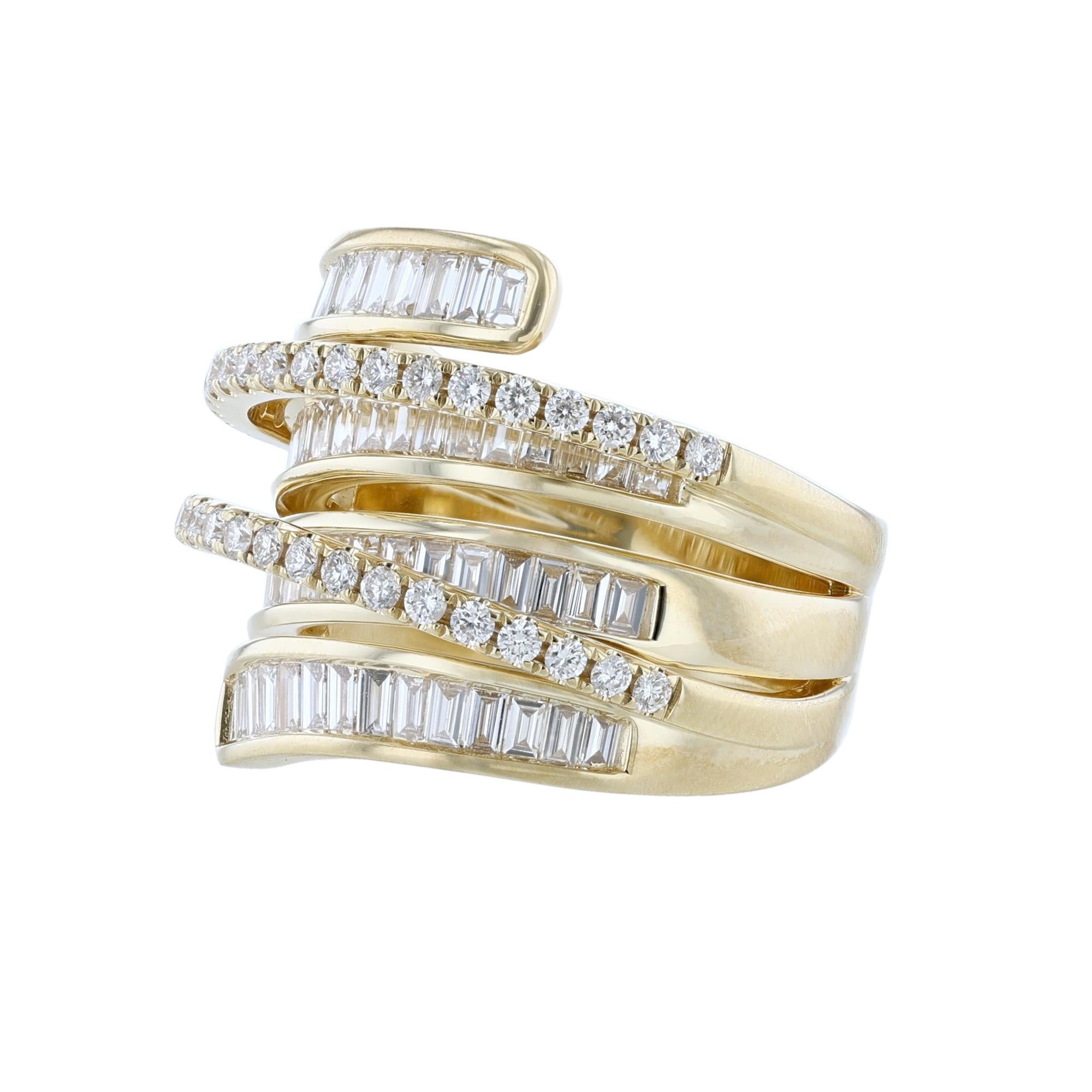 This ring is made in 18 Karat Yellow Gold. It features 40 round cut, prong set diamonds weighing 0.49 carats. Along with 62 tapered baguette cut, channel set diamonds weighing 1.39 carats. With a color grade (H) and clarity grade (SI2). 


