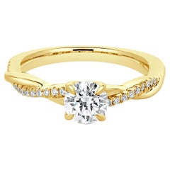 Verlobungsring aus 18 Karat Gelbgold mit rundem Diamanten im Brillantschliff