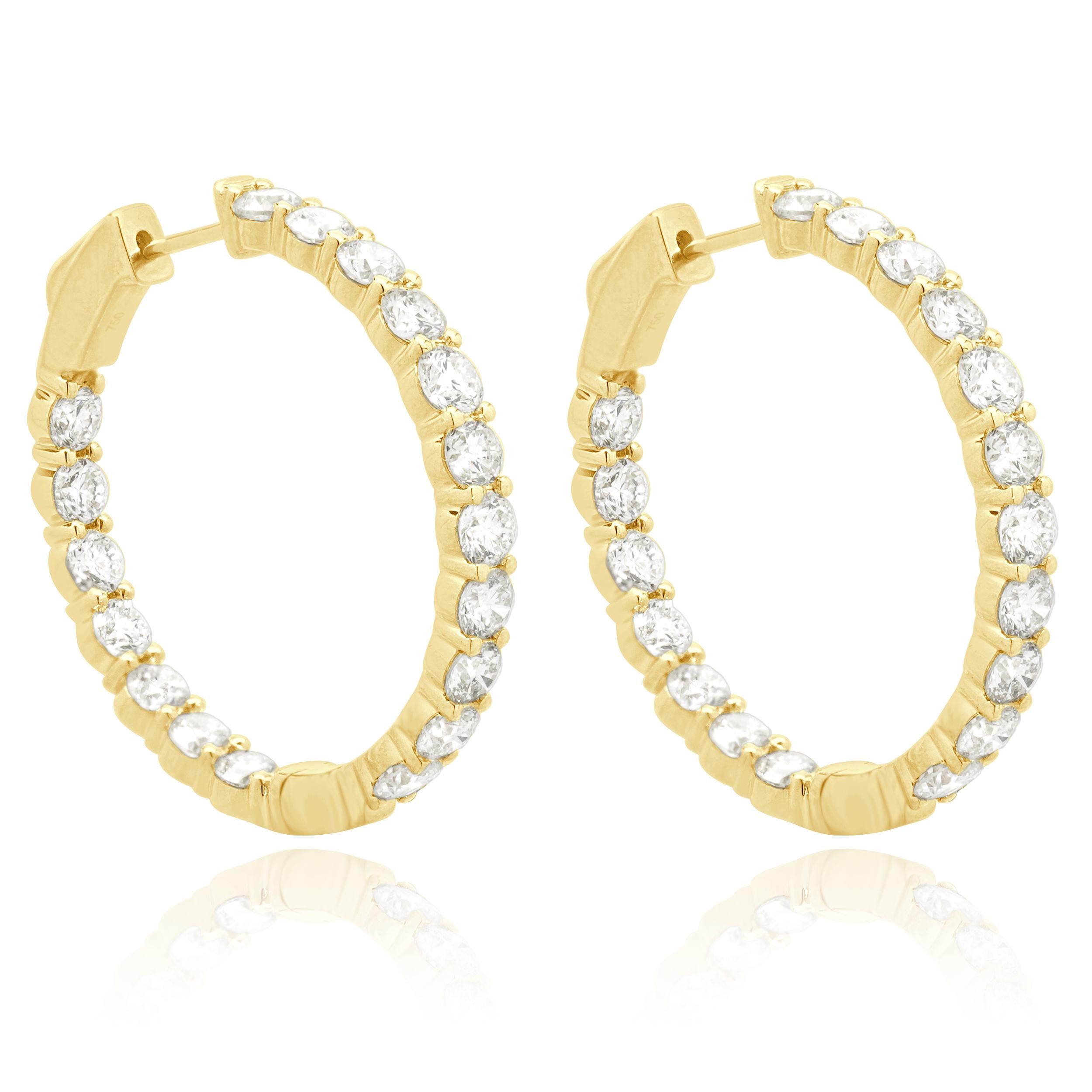 Material: oro amarillo de 18 quilates
Diamantes: 36 talla brillante redonda = 7,00ctw
Color: G / H
Claridad: VS2-SI1
Dimensiones: los pendientes miden aproximadamente 33 mm
Cierres: automáticos
Peso: 13,46 gramos
