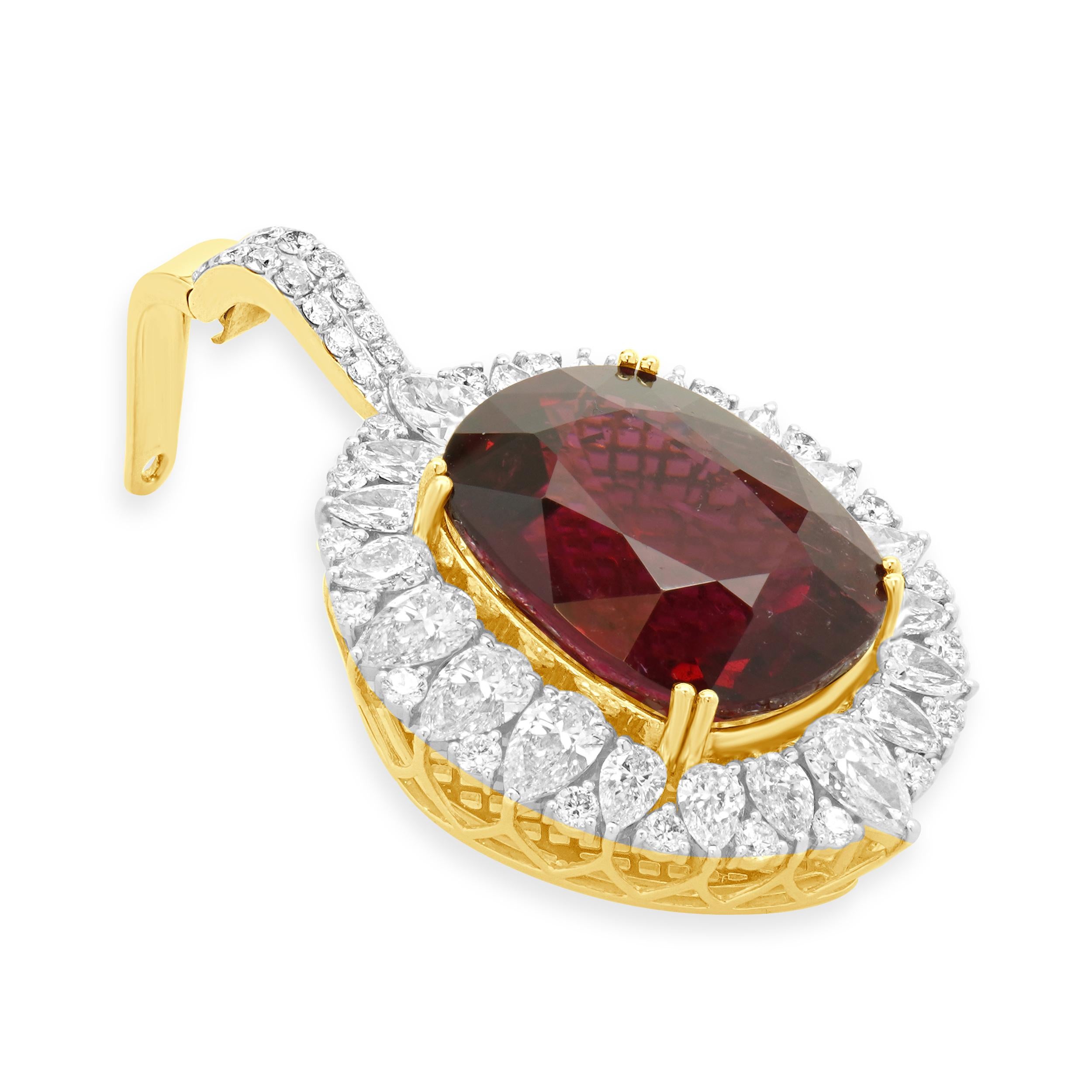 Designer: custom
Material: 18K yellow gold
Diamonds: 54 round and pear cut = 9.22ct
Color: F
Clarity: VS1-2
Tourmaline: cushion cut = 42.46cttw
Weight: 26.50 grams
