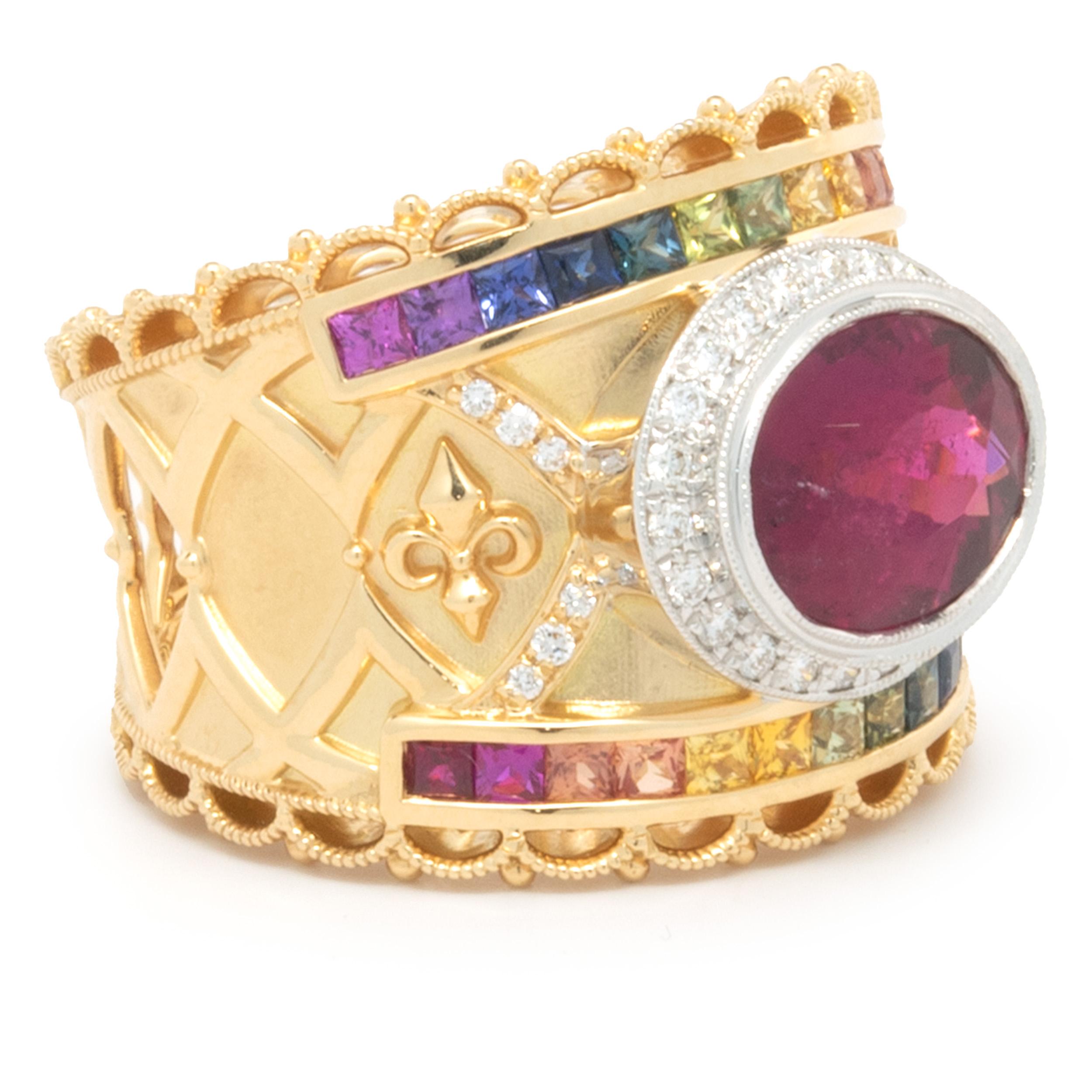 Designer: custom
Material: 18K yellow gold
Diamond: 34 round brilliant cut = 0.34cttw
Color: G
Clarity: VS1-2
Rubellite: 1 oval cut = 2.58ct
Rainbow Sapphire: 26 princess cut = 1.11cttw
Ring Size: 7 (complimentary sizing available)
Weight: 14.40