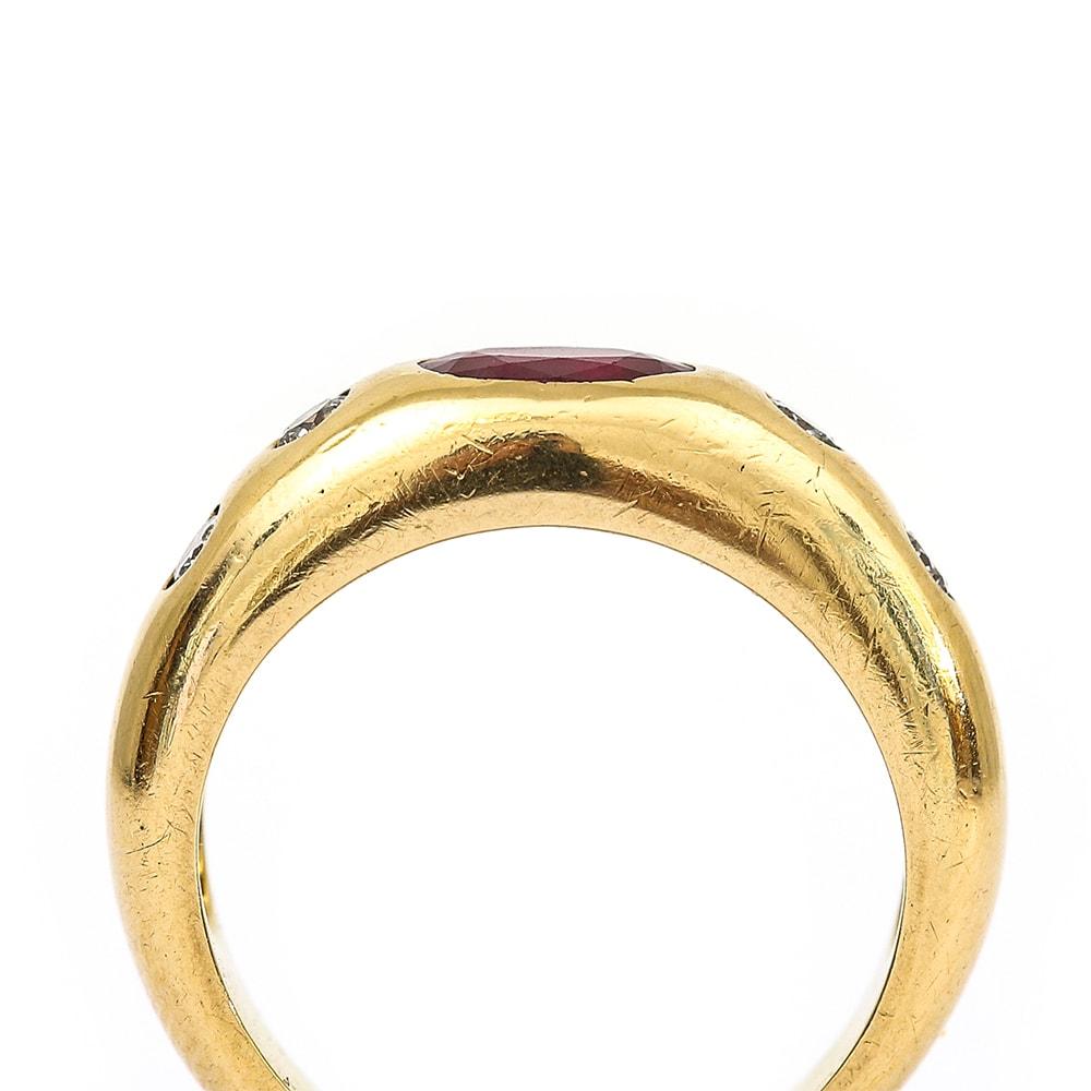 Oval Cut Cartier Style 18 Karat Yellow Gold Ruby and Diamond Gypsy Set Ring