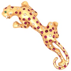 18 Karat Yellow Gold Ruby and Diamond Jaguar Pin