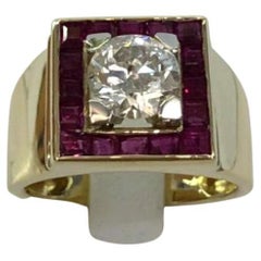 Anello con rubino e diamante in oro giallo 18 carati