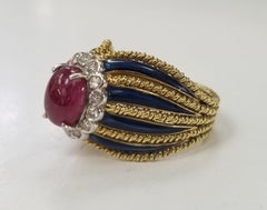 18 Karat Yellow Gold Ruby and Diamond Ring with 8 Blue Enamel Strips