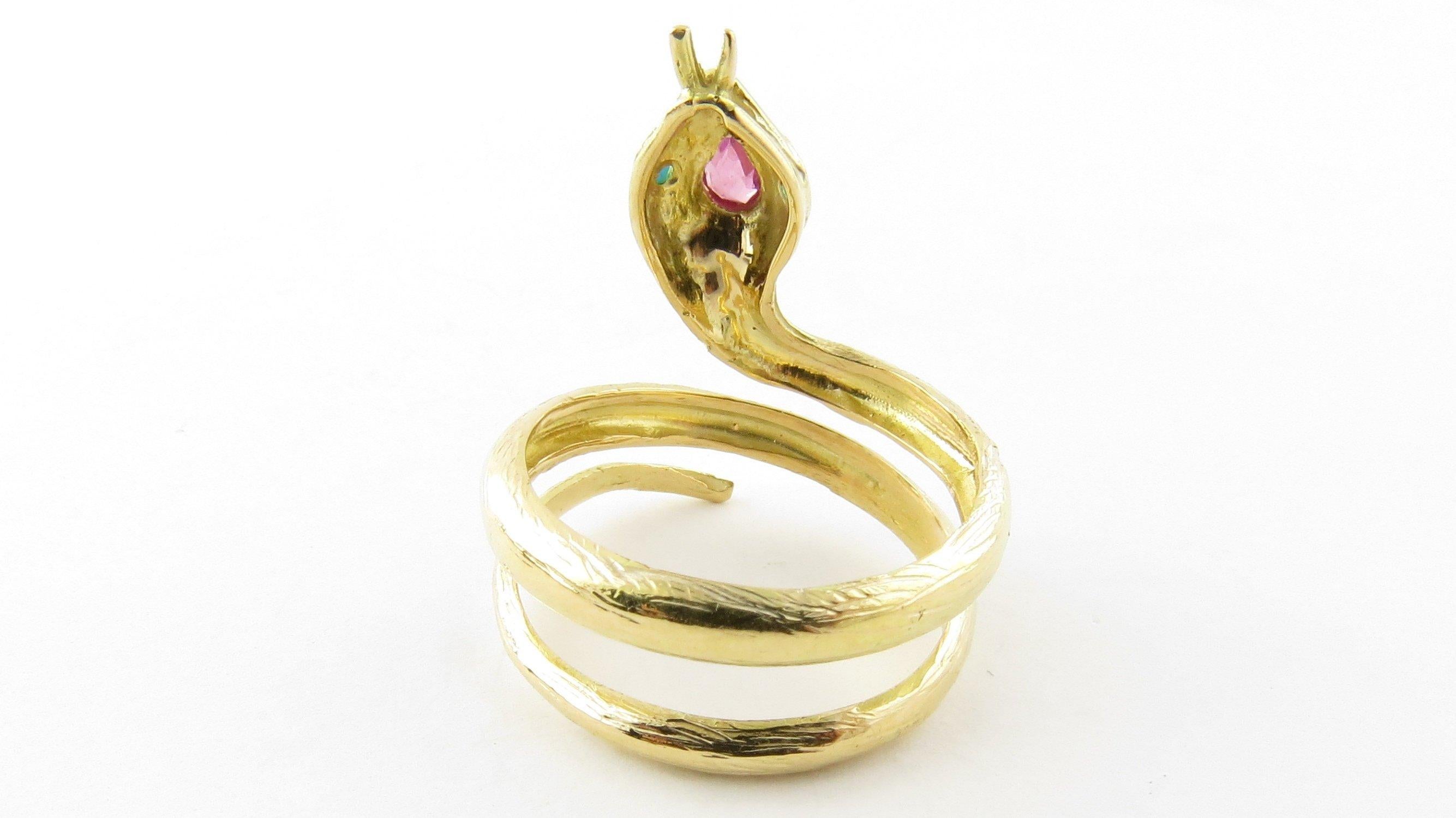 Vintage 18 Karat Yellow Gold Ruby and Turquoise Snake Ring Size 7.25- This lovely snake ring is detailed with one genuine ruby and two round turquoise stone set in beautifully detailed 18K yellow gold. Front of ring measures 25 mm. Shank measures 8