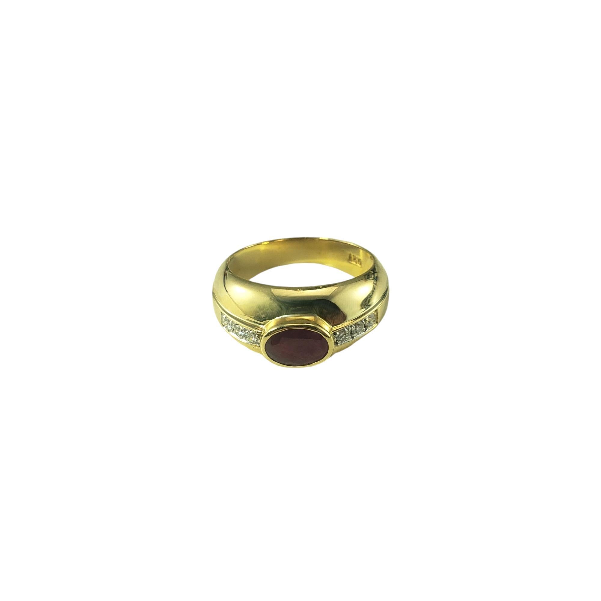 18 Karat Yellow Gold Ruby and Diamond Ring Size 6.5 JAGi Certified-

This stunning band features one oval ruby stone (6.9 mm x 5 mm) and six round brilliant cut diamonds set in 14K yellow gold.

Width: 9 mm. Shank: 4 mm.

Matching earrings: