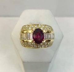 Bague en or jaune 18 carats, rubis et diamant
